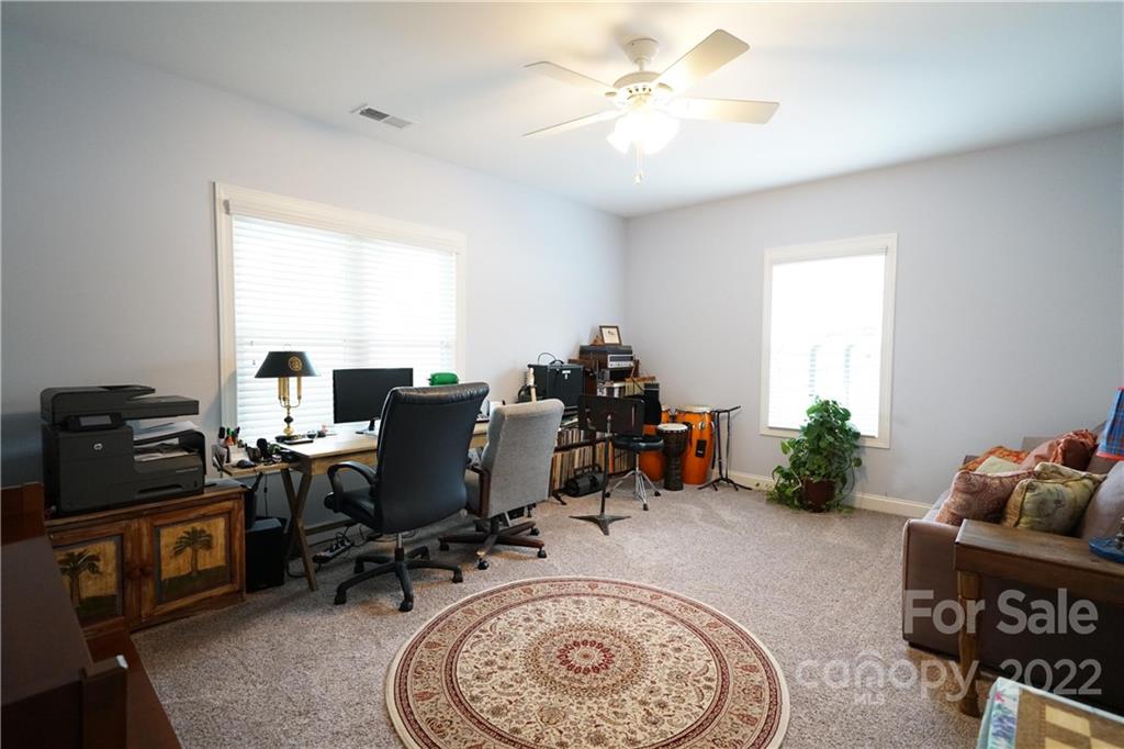 970 Lola Road Chester, SC 29706 - Photo 13 of 39 a view of a workspace with furniture and a window