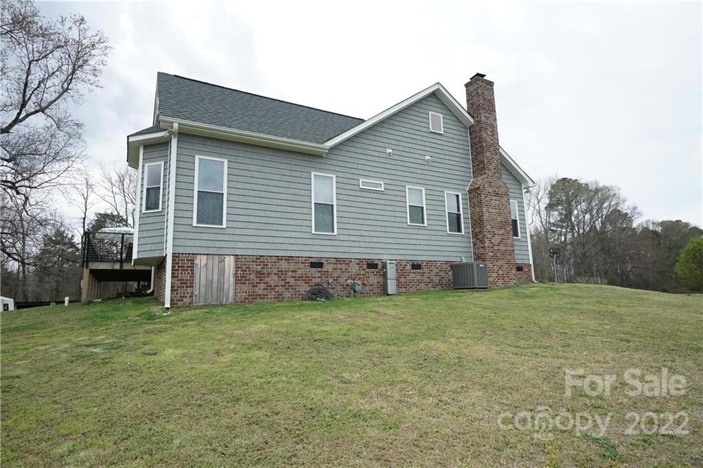 970 Lola Road Chester, SC 29706 - Photo 20 of 39 a view of a house with a yard