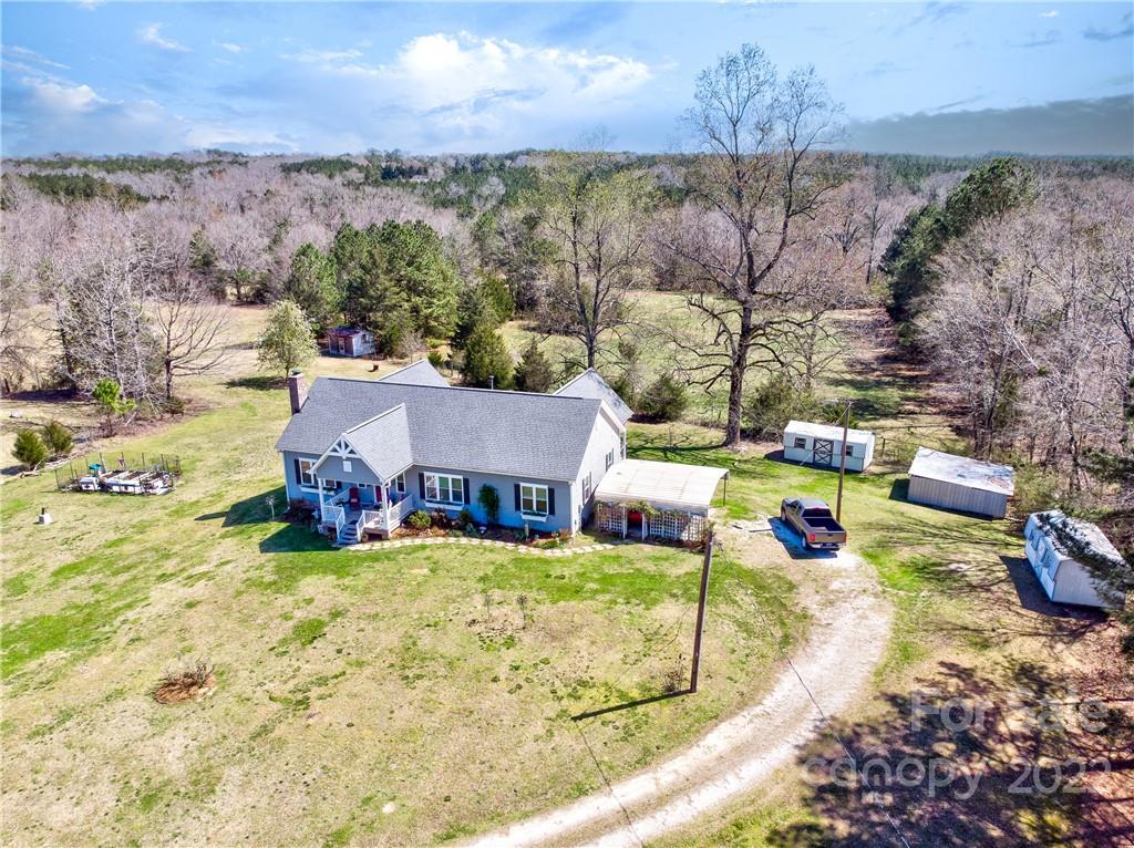 970 Lola Road Chester, SC 29706 - Photo 2 of 39 a view of a swimming pool with a yard