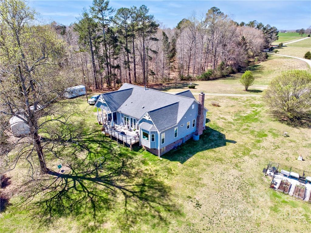 970 Lola Road Chester, SC 29706 - Photo 21 of 39 a swimming pool with trees in front of it