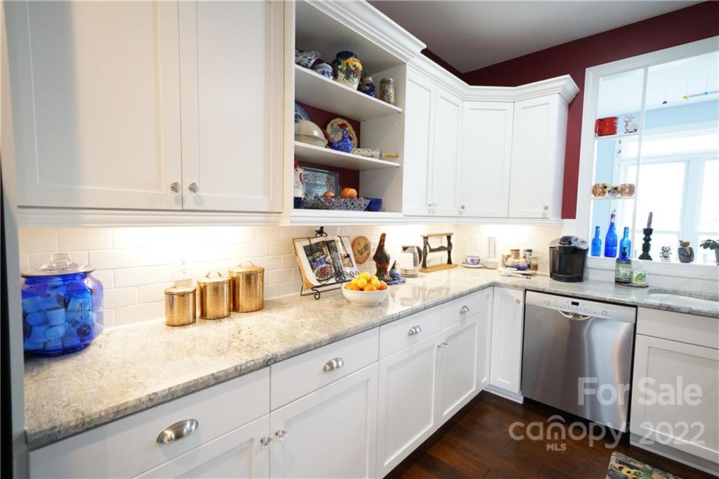 970 Lola Road Chester, SC 29706 - Photo 23 of 39 a kitchen with stainless steel appliances granite countertop a sink and cabinets