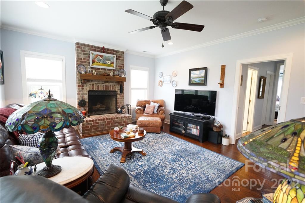 970 Lola Road Chester, SC 29706 - Photo 26 of 39 a living room with furniture or couch and a fireplace
