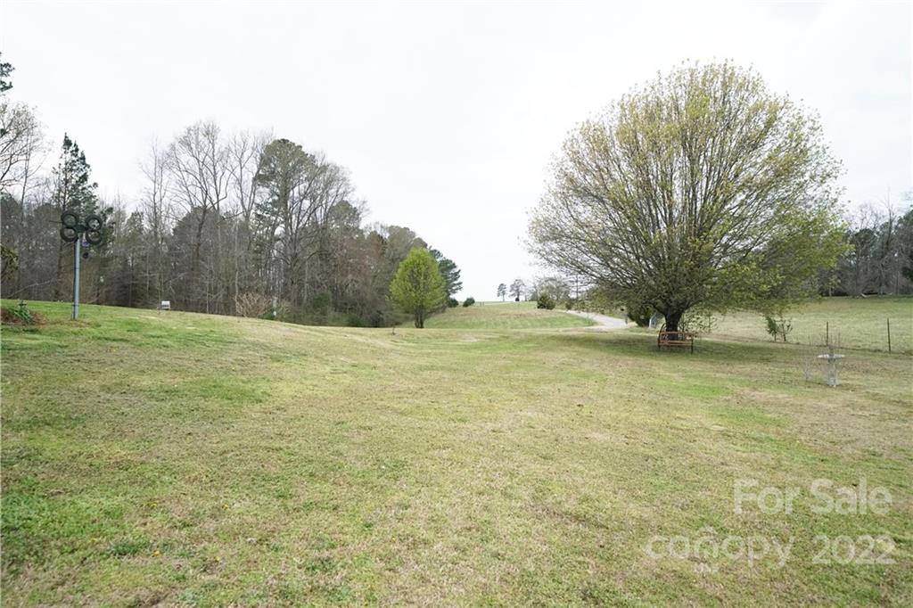 970 Lola Road Chester, SC 29706 - Photo 3 of 39 a view of outdoor space with trees all around