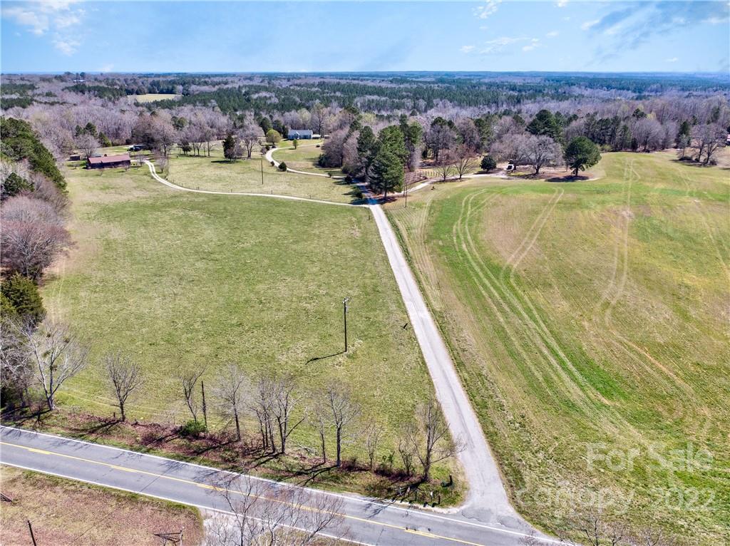 970 Lola Road Chester, SC 29706 - Photo 35 of 39 a view of a swimming pool with a yard