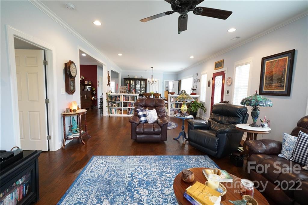 970 Lola Road Chester, SC 29706 - Photo 9 of 39 a living room with furniture kitchen view and a wooden floor