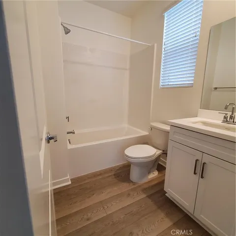 a view of a street with buildings