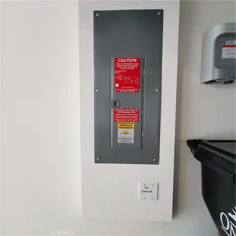 a view of a pathway with a house in the background