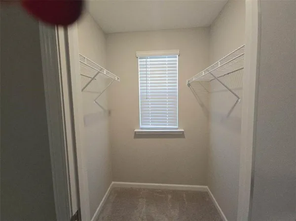 a view of small space with racks on the wall