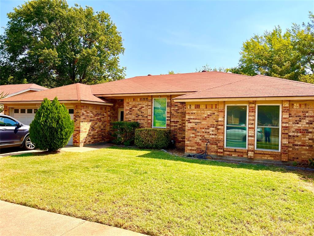 3425 Derby Circle Bedford, TX 76021 - Photo 1 of 1 a view of a house with a yard and potted plants