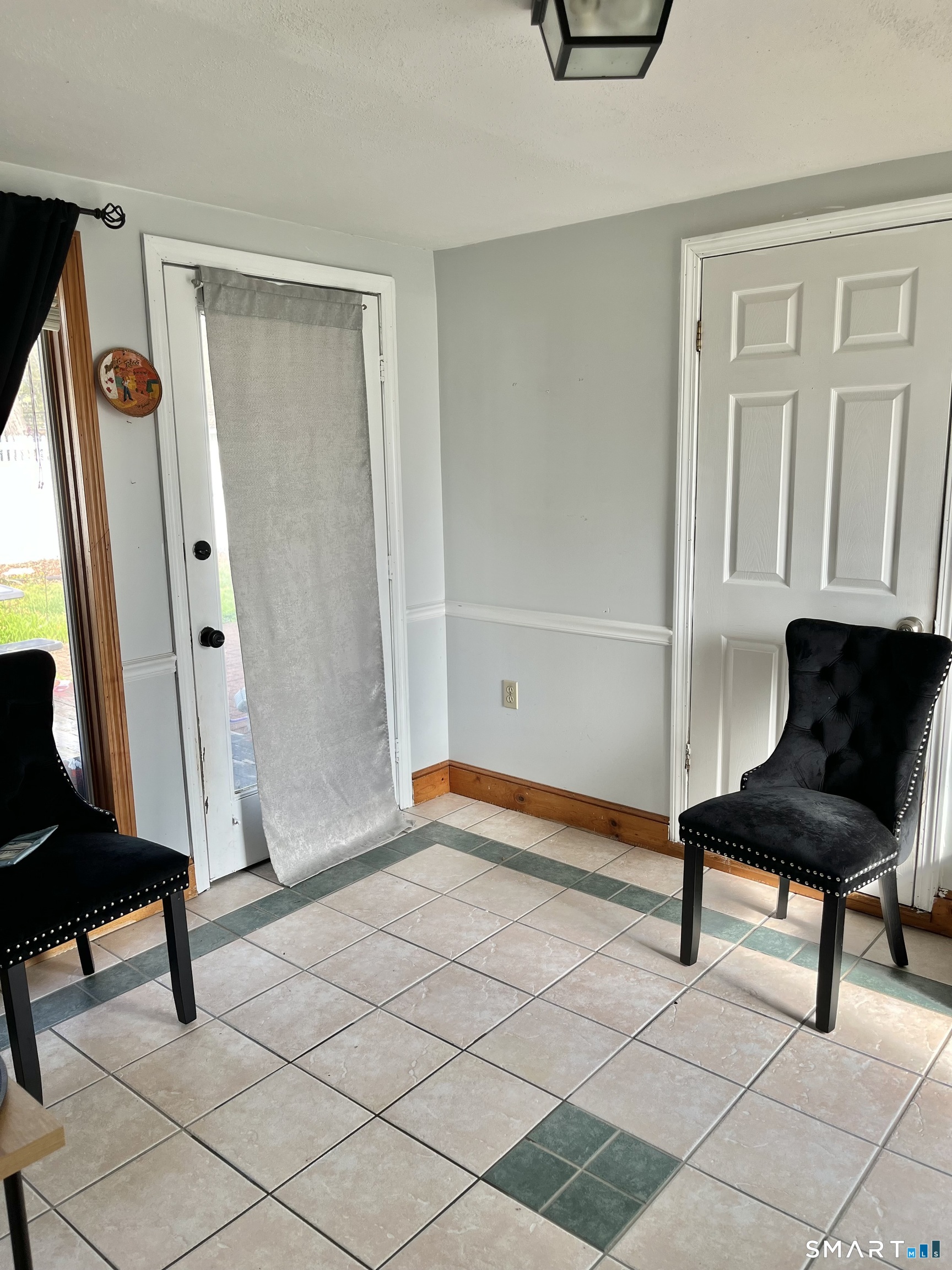 11 Marcy Road Bridgeport, CT 06606 - Photo 12 of 19 a living room with a furniture and a window