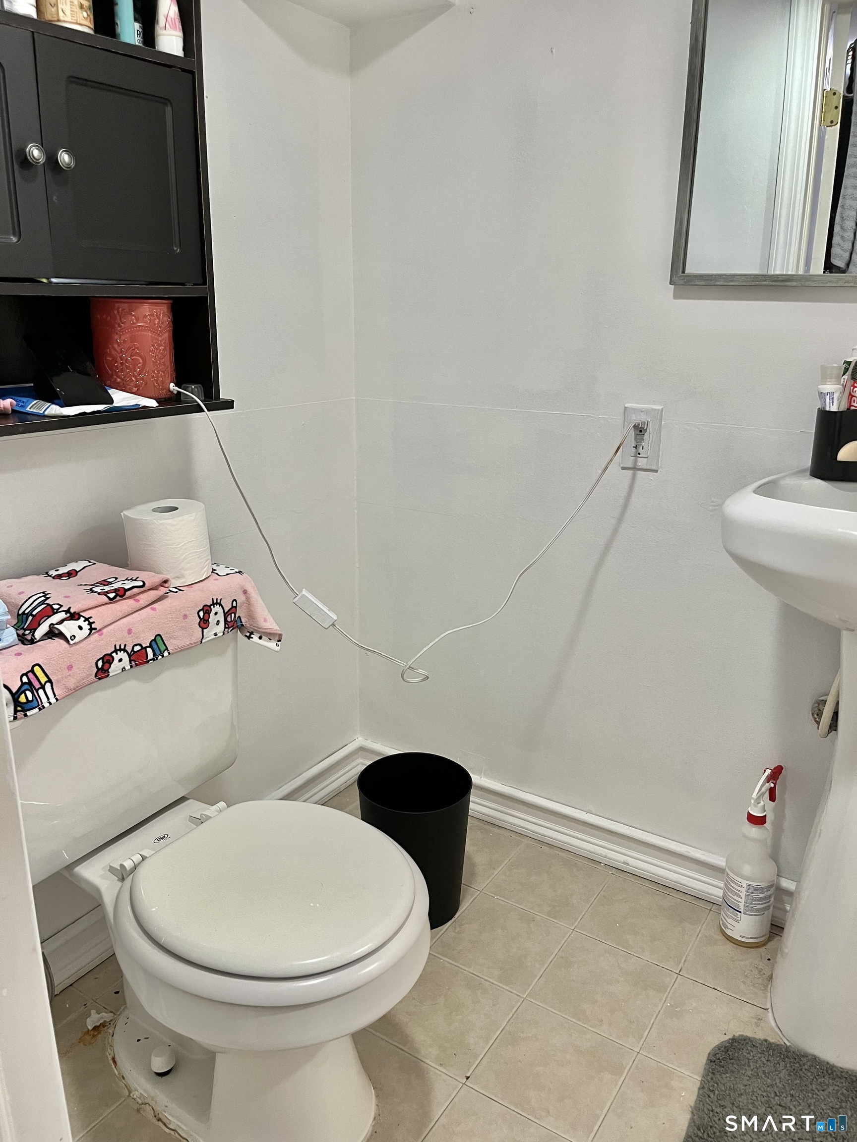 11 Marcy Road Bridgeport, CT 06606 - Photo 15 of 19 a bathroom with a sink and a toilet