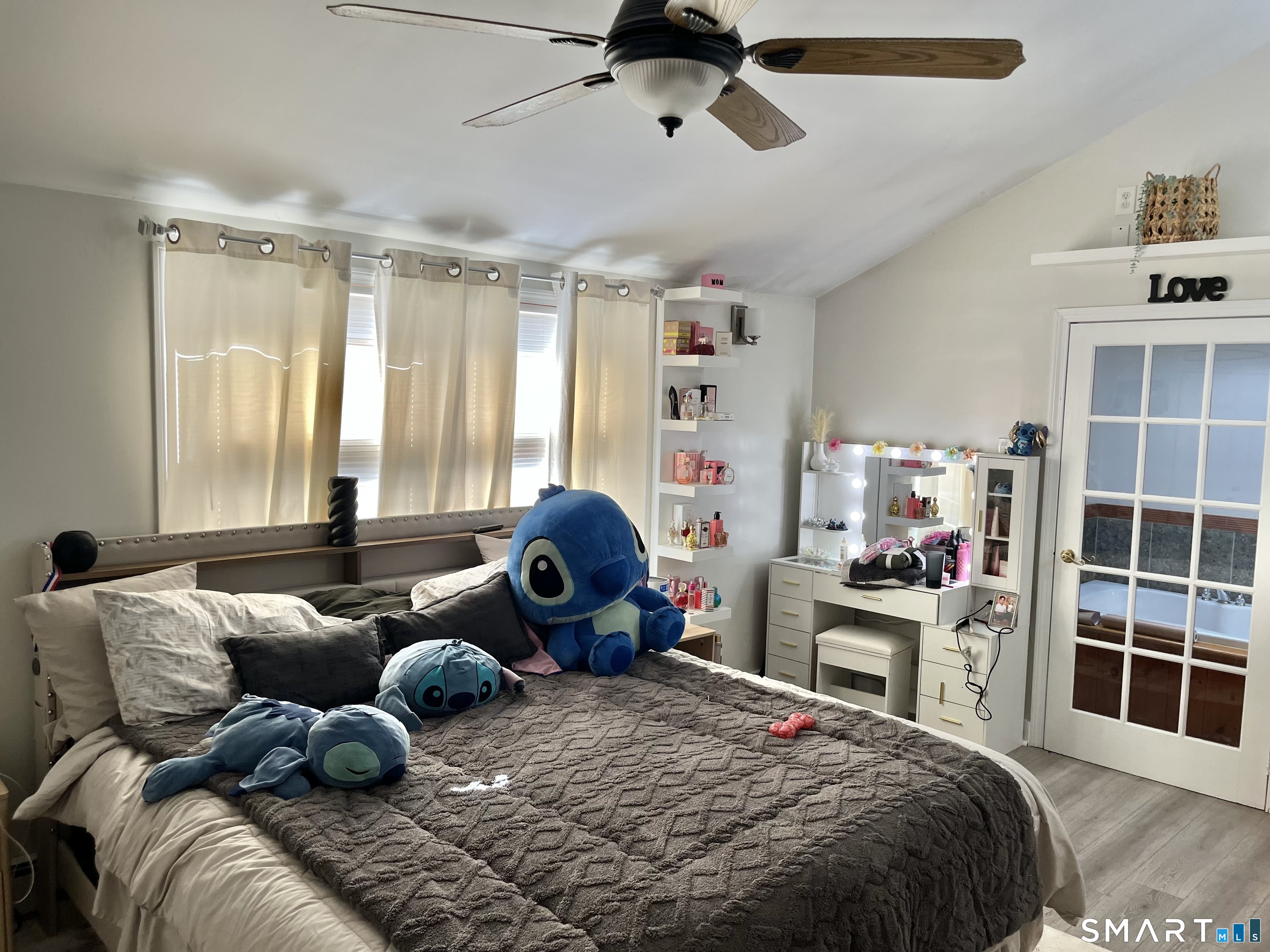 11 Marcy Road Bridgeport, CT 06606 - Photo 5 of 19 a bedroom with a bed and a window