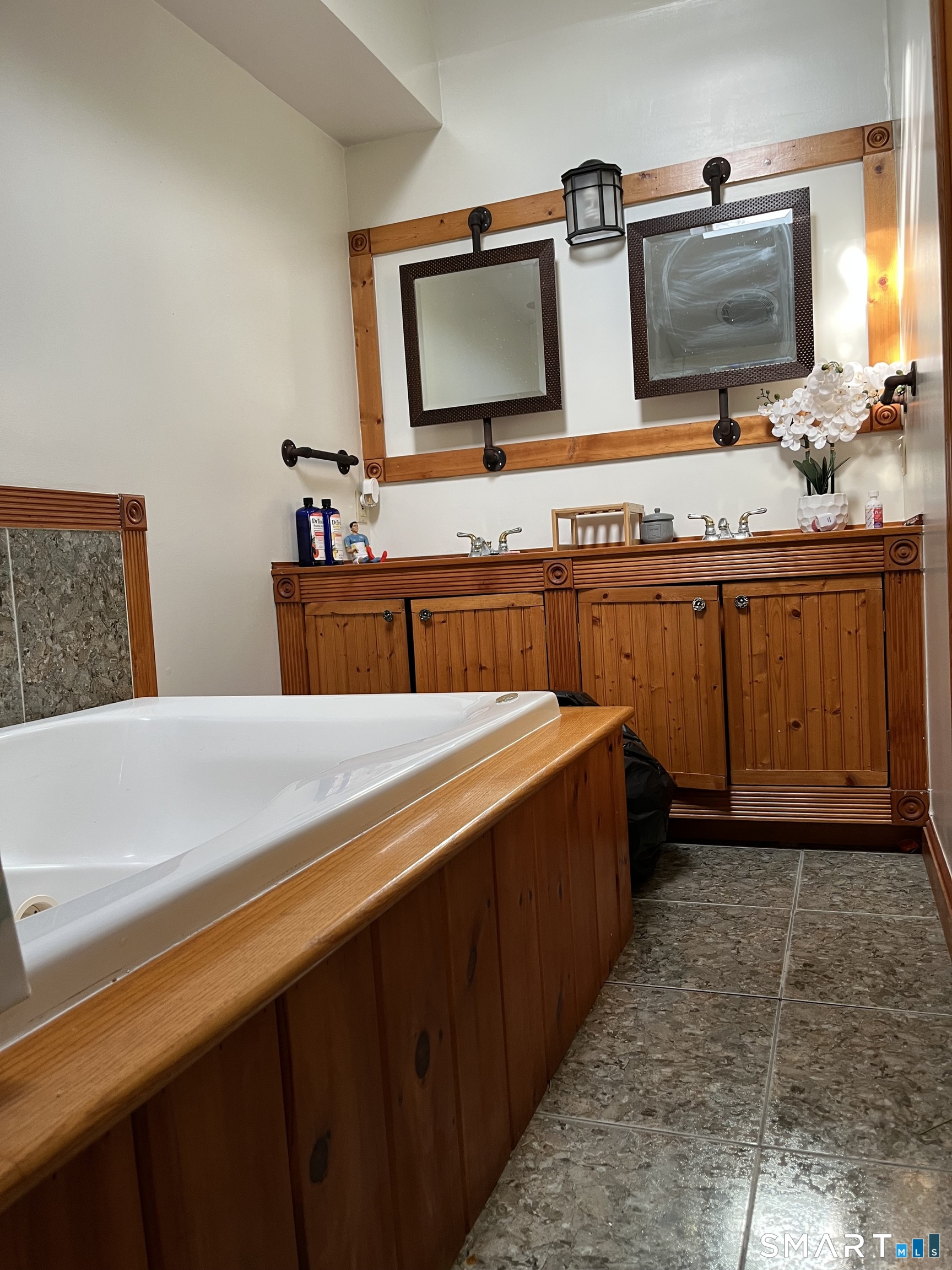 11 Marcy Road Bridgeport, CT 06606 - Photo 6 of 19 a spacious bathroom with a sink and a mirror