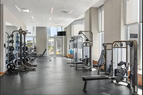 a view of a room with gym equipment