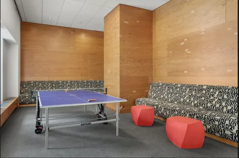 a patio with table and chairs