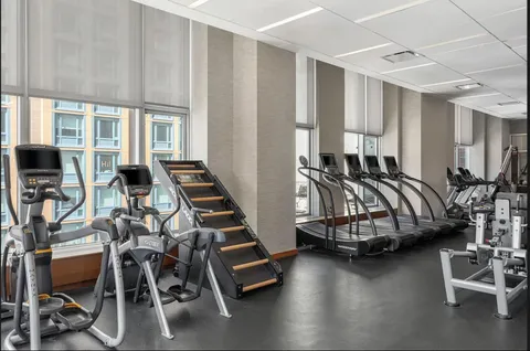 a view of a room with gym equipment