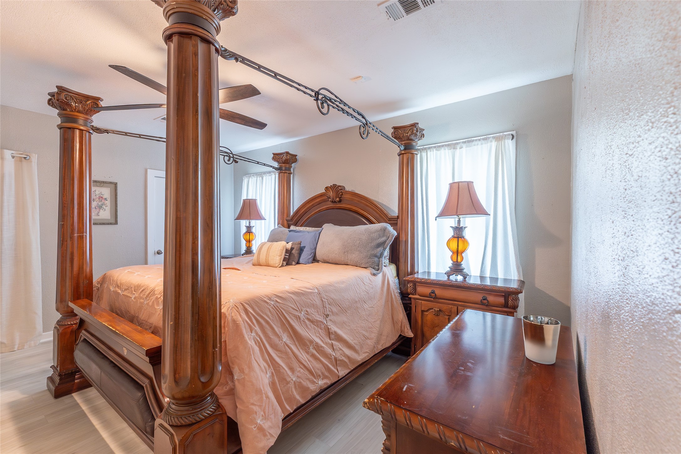 2118 Rolling Hills Road Conroe, TX 77303 - Photo 24 of 39 Spacious bedroom offers warmth, character, and plenty of room to unwind.
