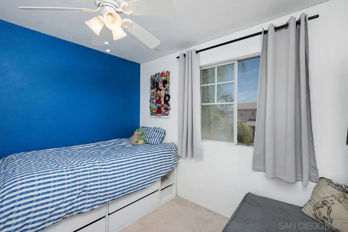 39537 Tischa Drive Temecula, CA 92591 - Photo 14 of 35 a bedroom with a bed and a window