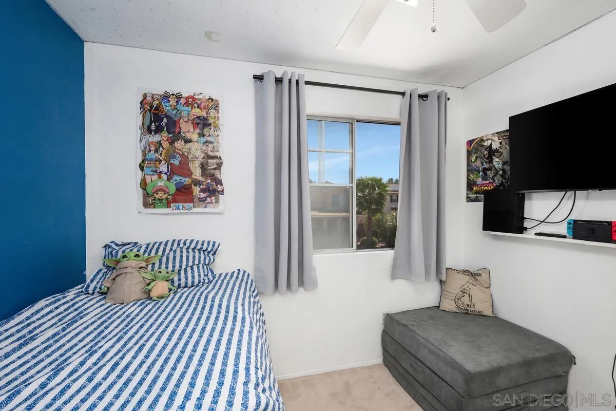 39537 Tischa Drive Temecula, CA 92591 - Photo 15 of 35 a bedroom with a bed and a flat screen tv