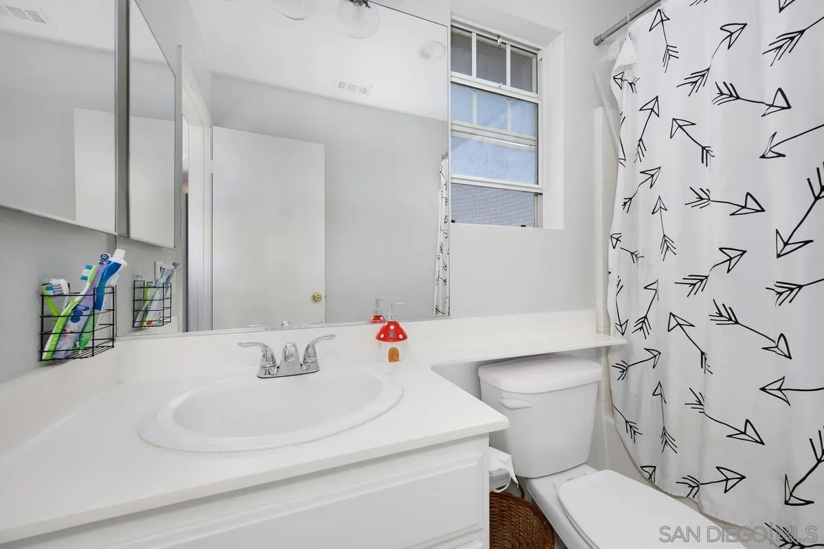 39537 Tischa Drive Temecula, CA 92591 - Photo 16 of 35 a bathroom with a sink toilet and shower