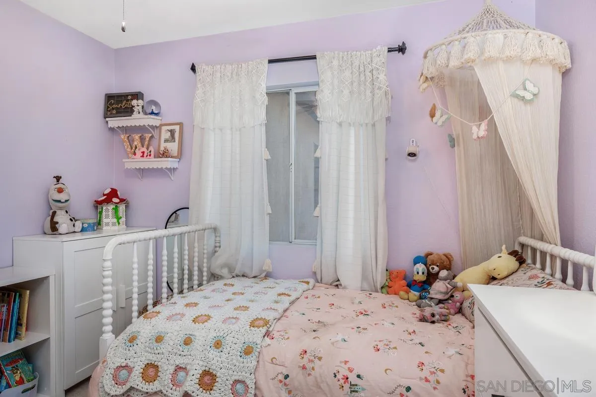 39537 Tischa Drive Temecula, CA 92591 - Photo 18 of 35 a bedroom with a bed and a dresser in it