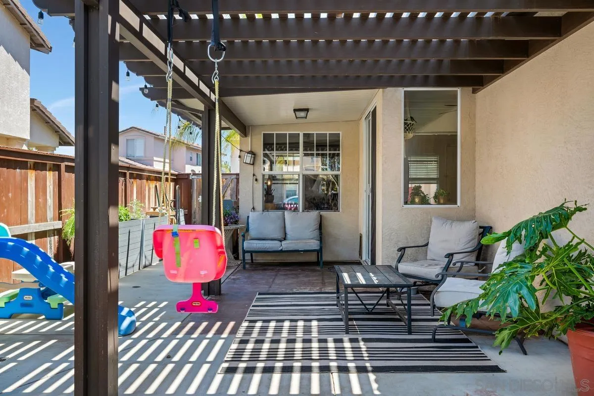 39537 Tischa Drive Temecula, CA 92591 - Photo 27 of 35 a front view of a house with outdoor seating