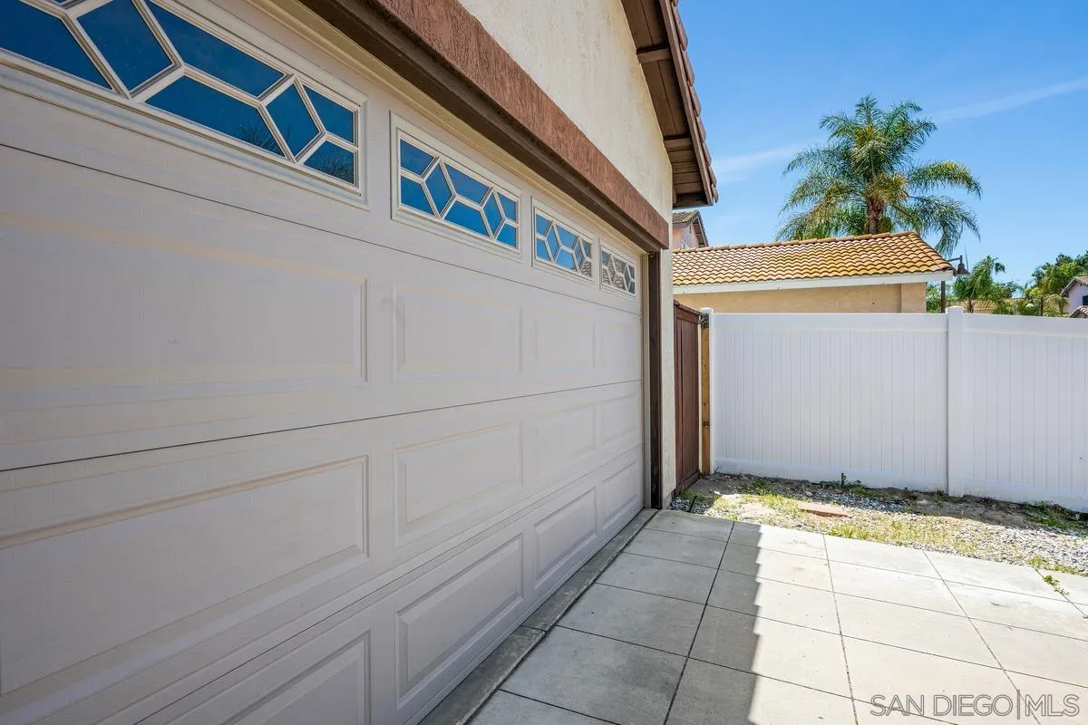 39537 Tischa Drive Temecula, CA 92591 - Photo 28 of 35 a view of a house with a garage