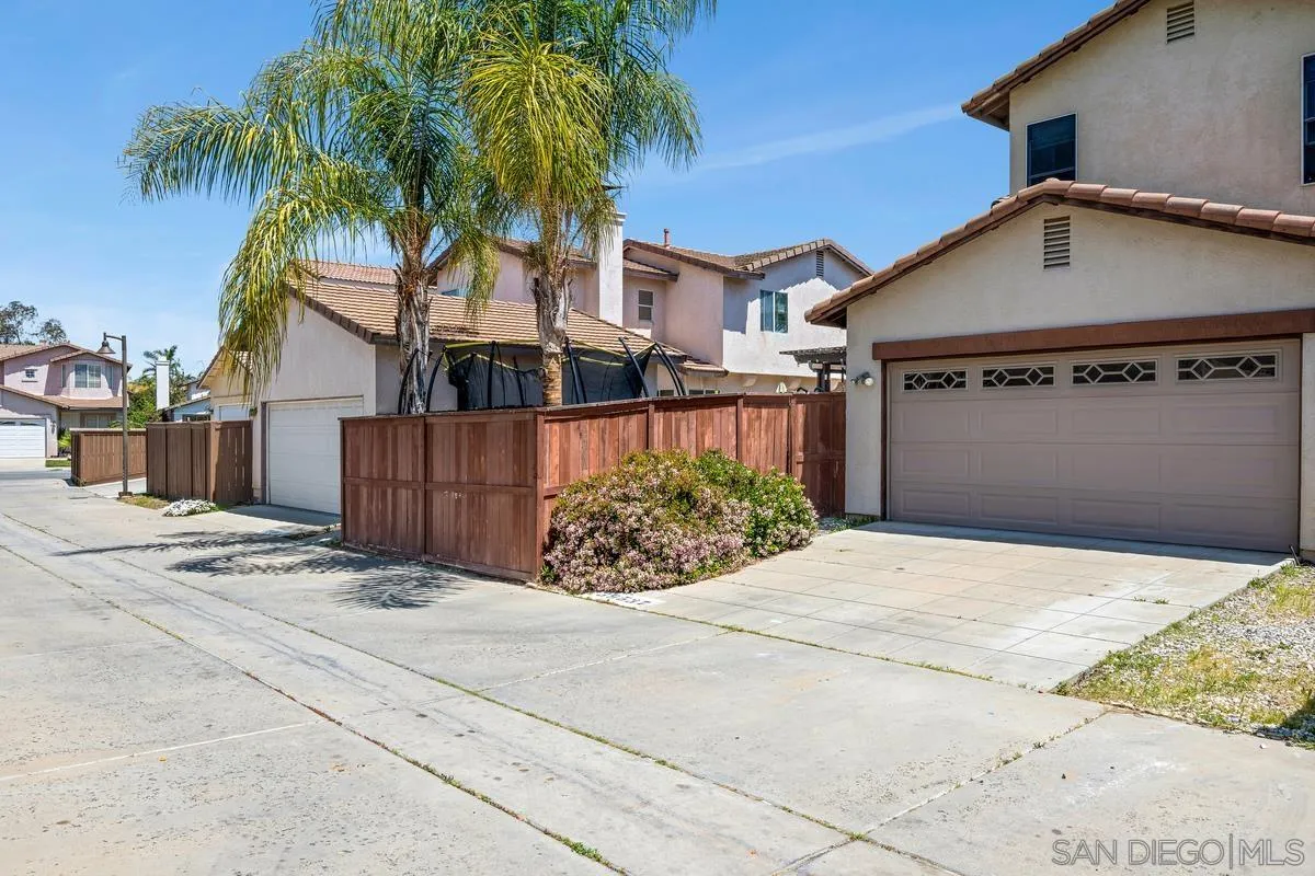 39537 Tischa Drive Temecula, CA 92591 - Photo 30 of 35 a front view of a house with a yard