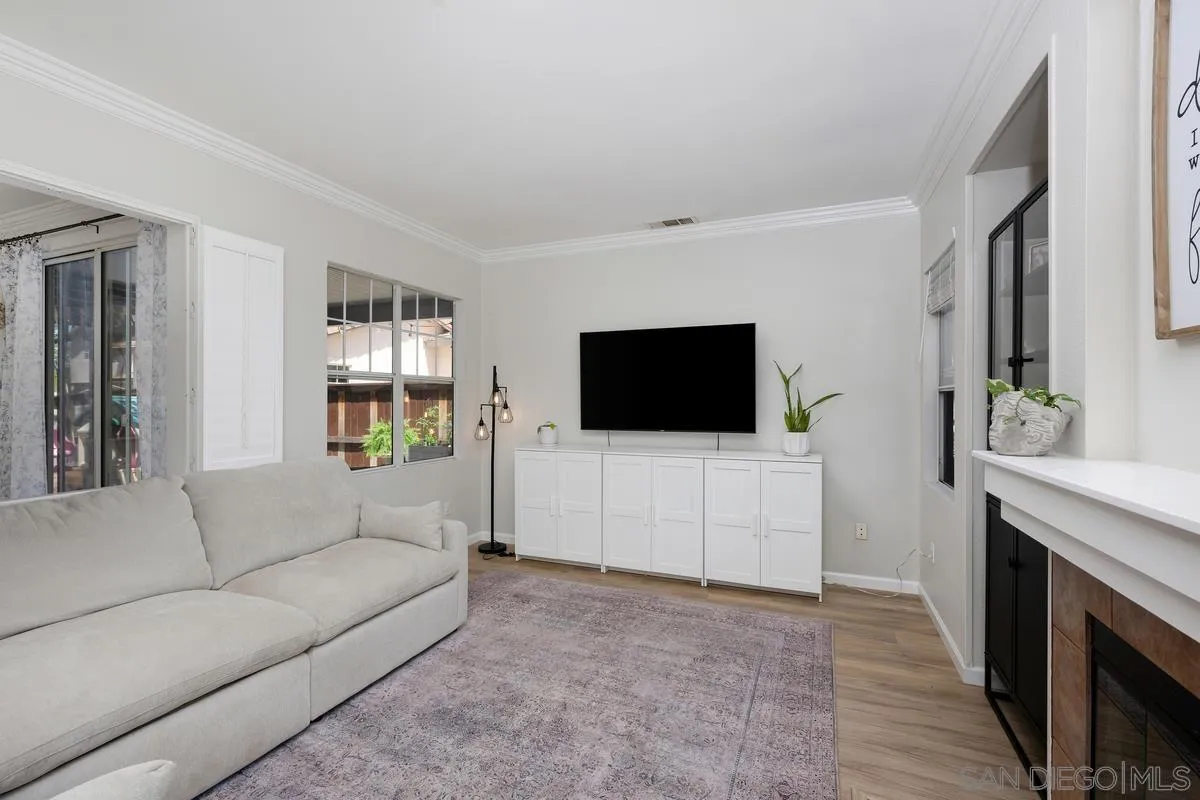 39537 Tischa Drive Temecula, CA 92591 - Photo 5 of 35 a living room with furniture and a flat screen tv
