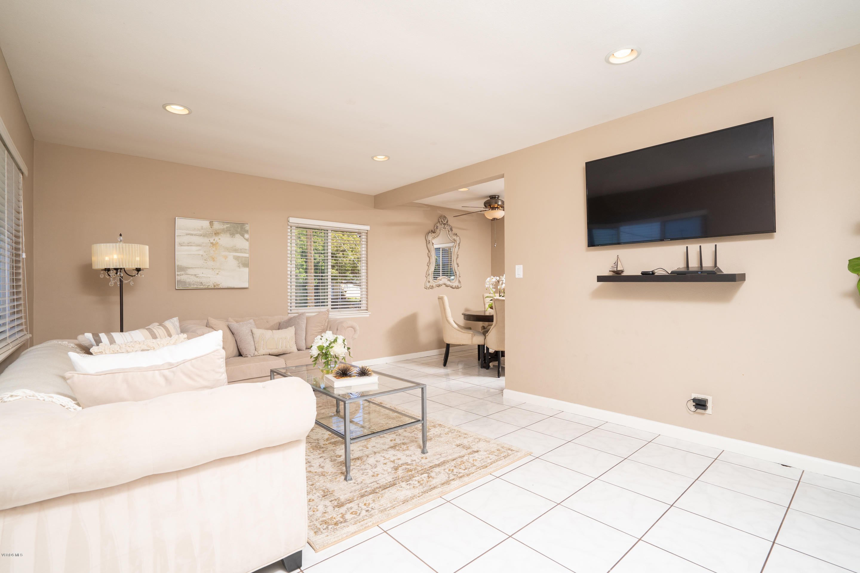 200 Brucker Road West Oxnard, CA 93033 - Photo 3 of 18 a living room with furniture and a flat screen tv