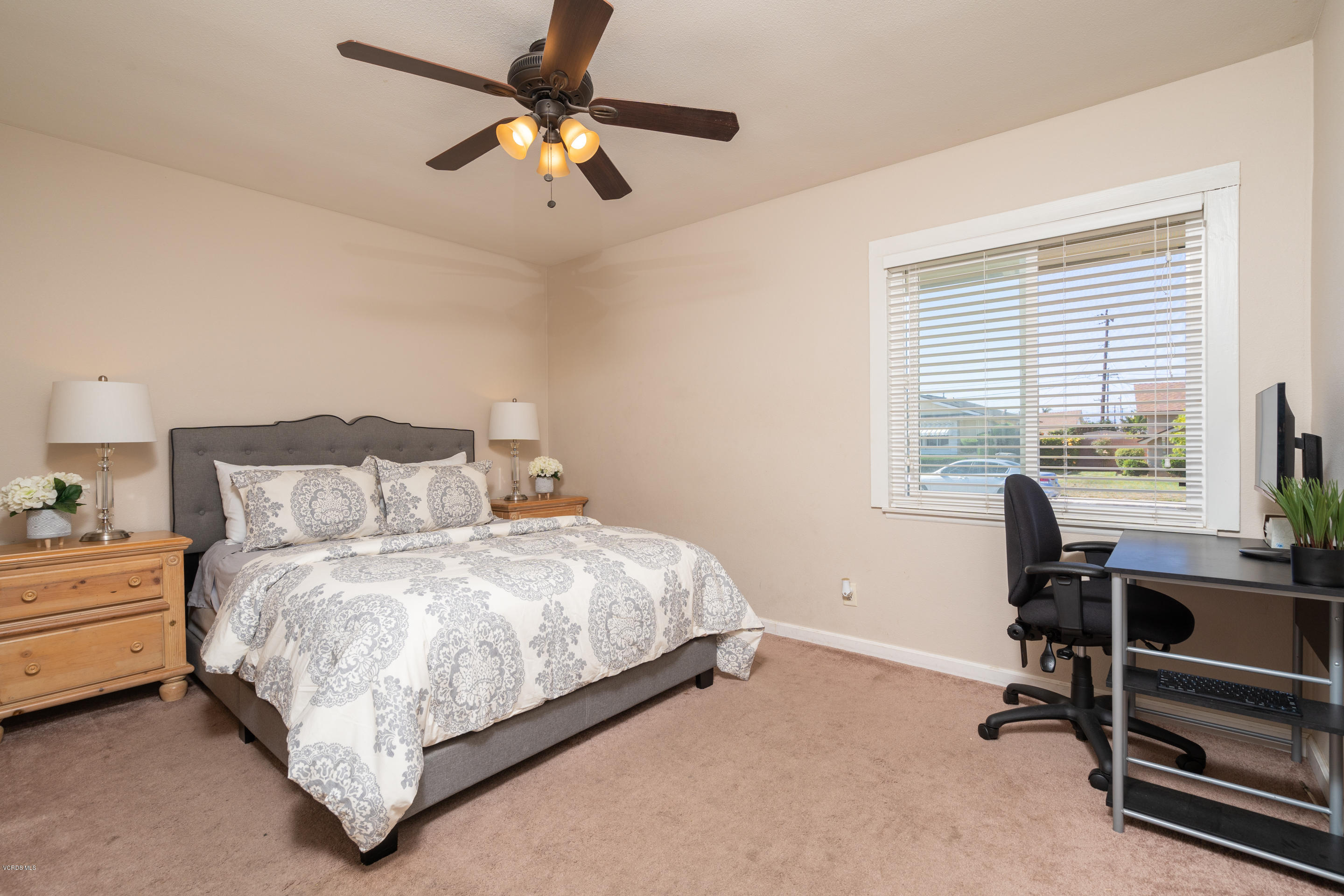200 Brucker Road West Oxnard, CA 93033 - Photo 8 of 18 a bedroom with a bed a desk and chair