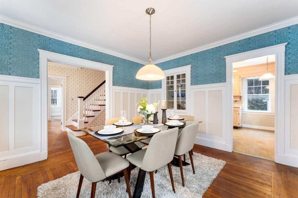 10 Hinckley Road Newton, MA 02468 - Photo 13 of 41 a view of a dining room with furniture window and wooden floor