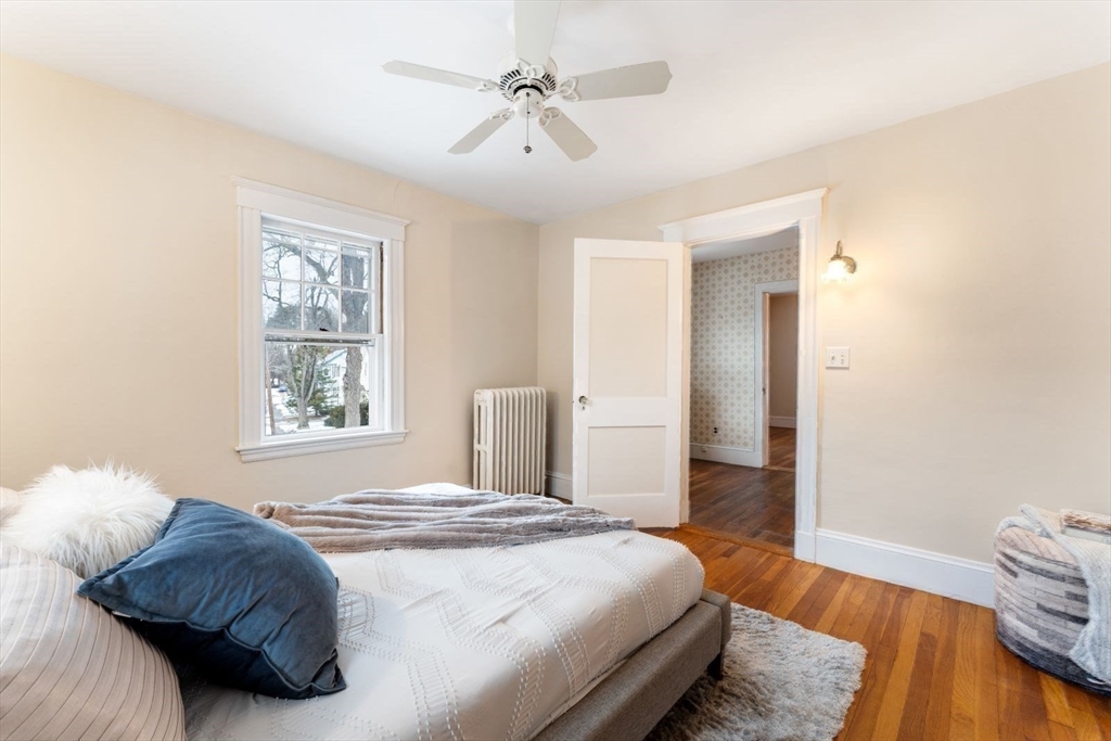 10 Hinckley Road Newton, MA 02468 - Photo 23 of 41 a bedroom with a bed and a window