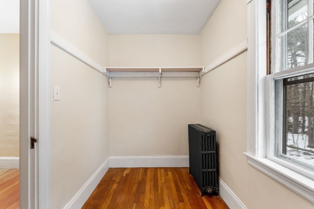 10 Hinckley Road Newton, MA 02468 - Photo 33 of 41 a bathroom with a window and a shower