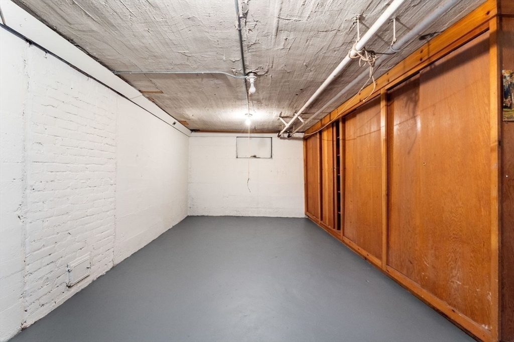 10 Hinckley Road Newton, MA 02468 - Photo 34 of 41 a view of hallway with painted walls