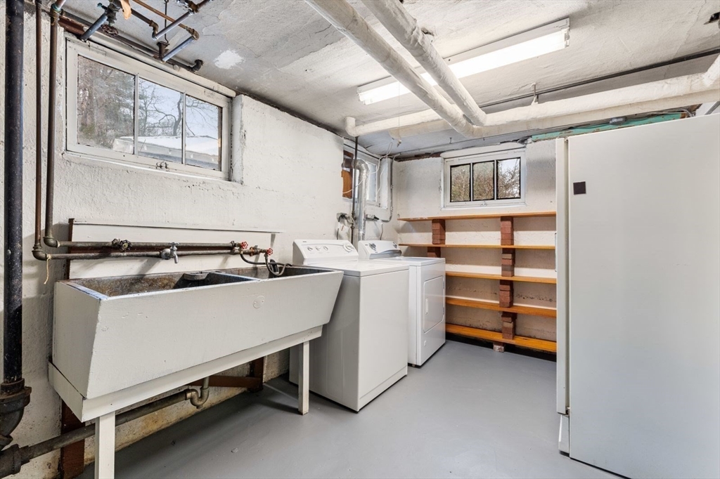 10 Hinckley Road Newton, MA 02468 - Photo 37 of 41 a utility room with dryer and washer