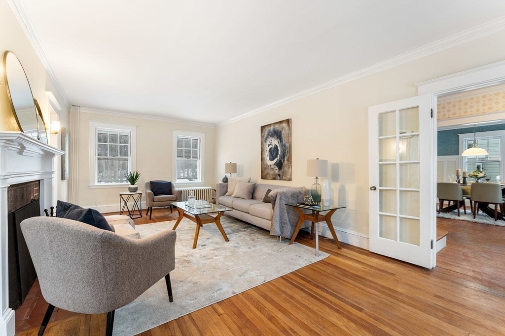 10 Hinckley Road Newton, MA 02468 - Photo 7 of 41 a living room with furniture wooden floor and a fireplace