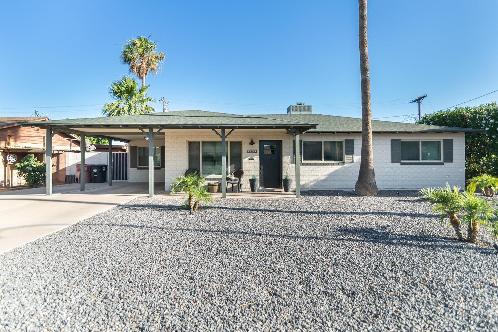 7435 East Granada Road Scottsdale, AZ 85257 - Photo 8 of 28 front view of a house with a porch
