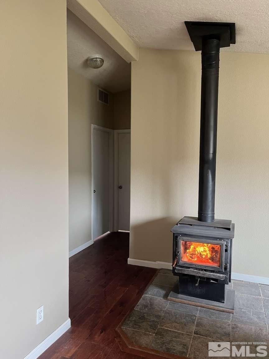 3395 Basque Oven Road Reno, NV 89510 - Photo 15 of 40 an empty room with a mirror and a floor to ceiling window