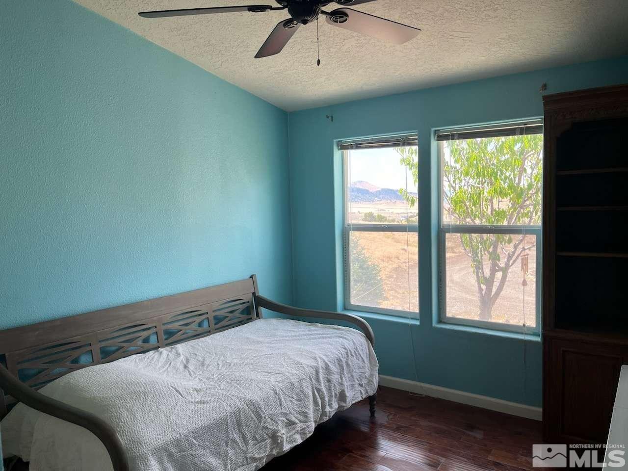 3395 Basque Oven Road Reno, NV 89510 - Photo 16 of 40 a bedroom with a bed and a window