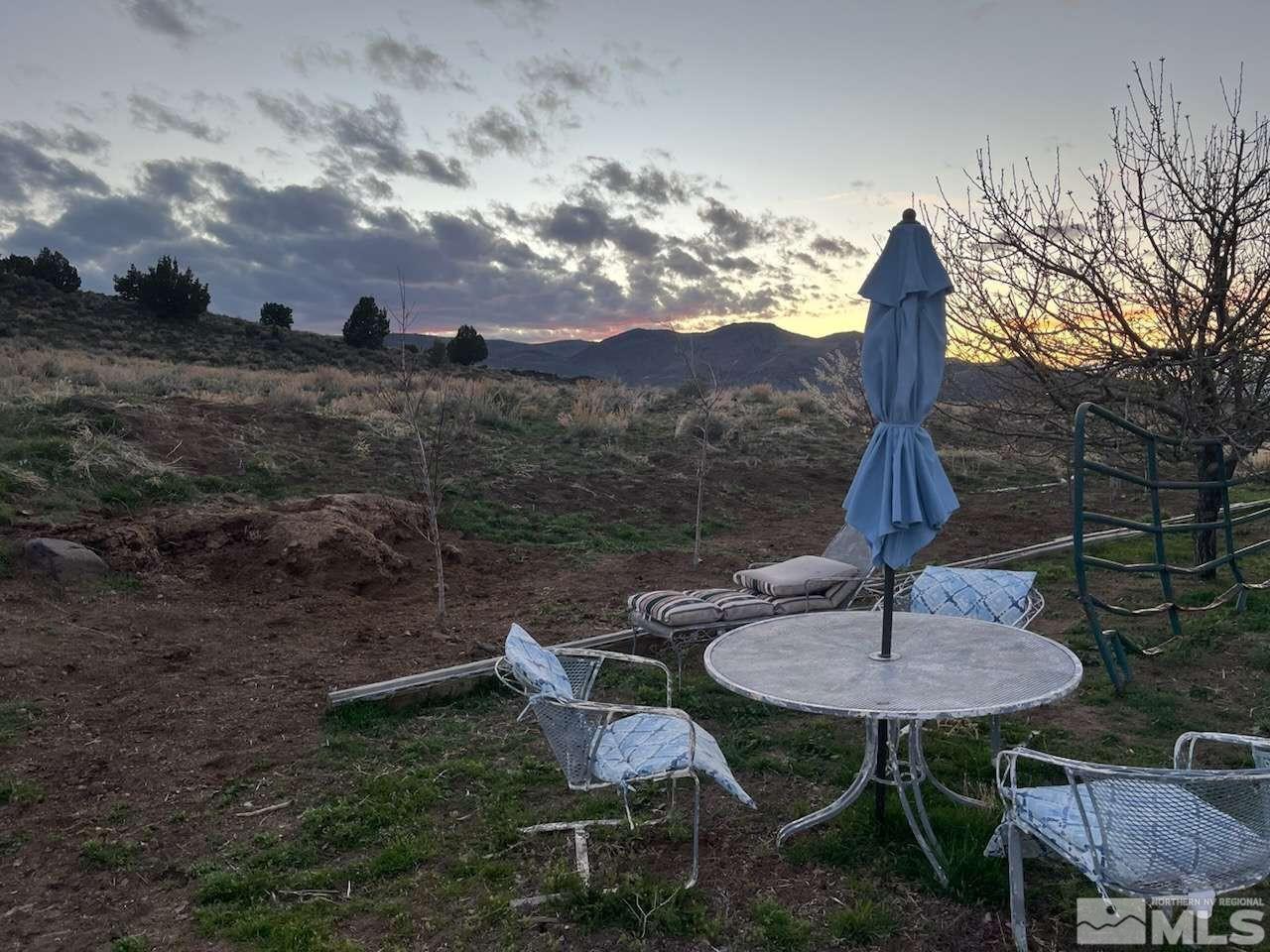 3395 Basque Oven Road Reno, NV 89510 - Photo 30 of 40 a table and chairs in front of a house