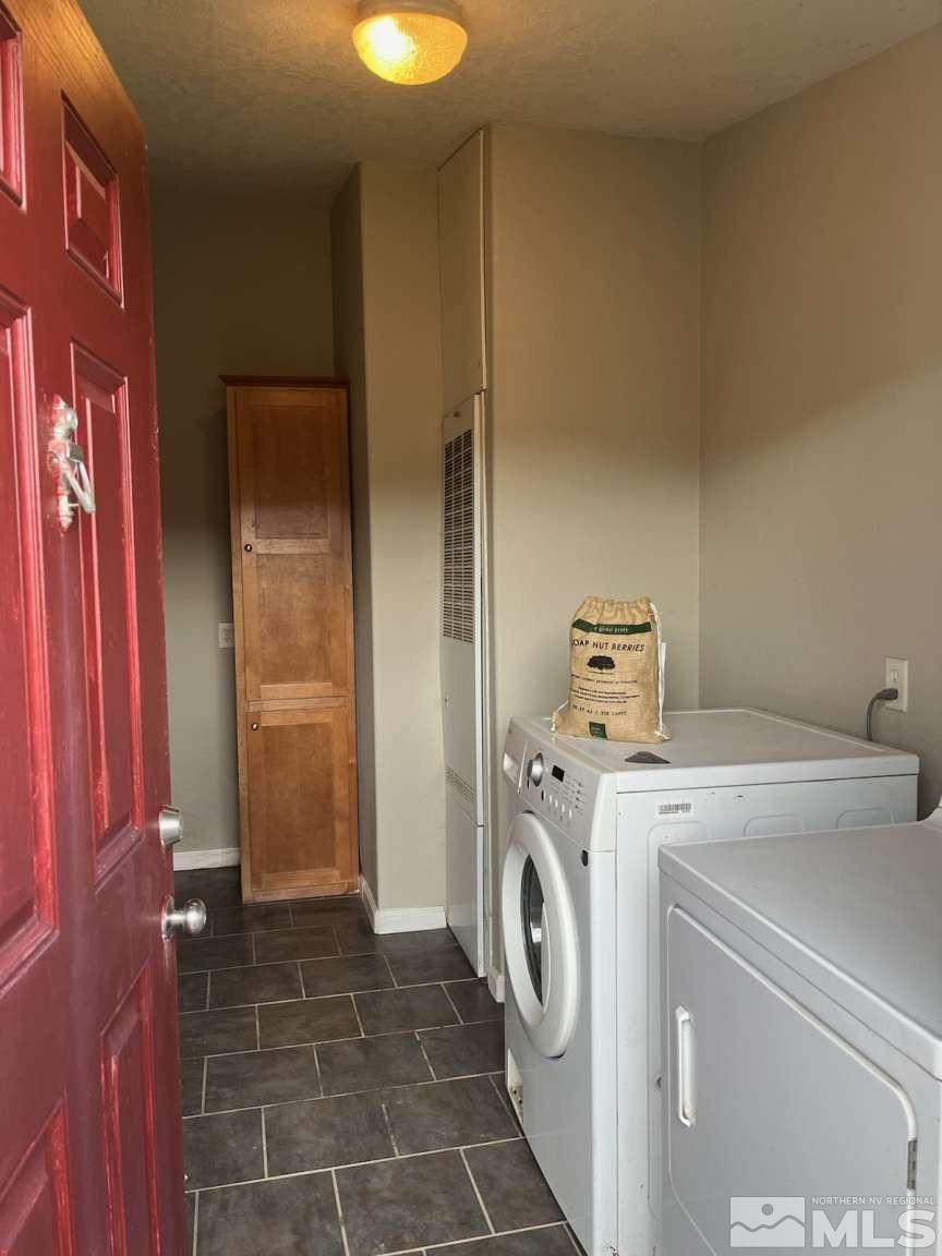 3395 Basque Oven Road Reno, NV 89510 - Photo 39 of 40 a utility room with dryer and washer