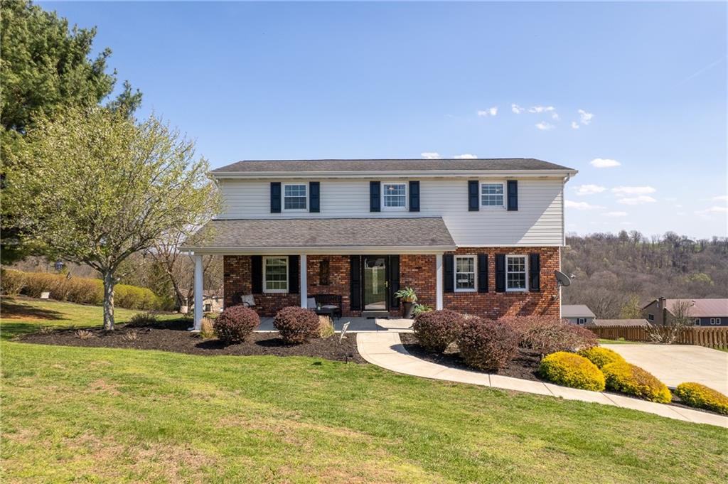 Solid and well-designed 4-bedroom home in Franklin Manor featuring a 2-car side-entry integral garage, situated on a 0.5 acre corner lot with a concrete driveway and covered front porch.