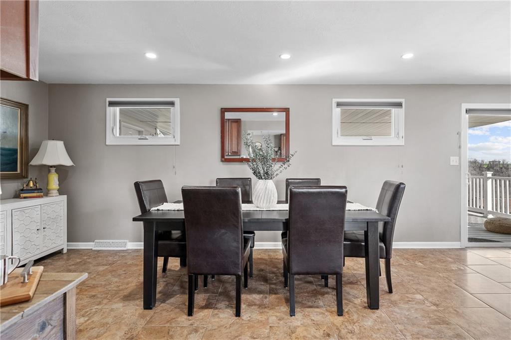 3032 Investors Road Washington, PA 15301 - Photo 15 of 50 Open eat-in kitchen with a large island connecting to the dining area, creating a seamless space for hosting 20+ guests.