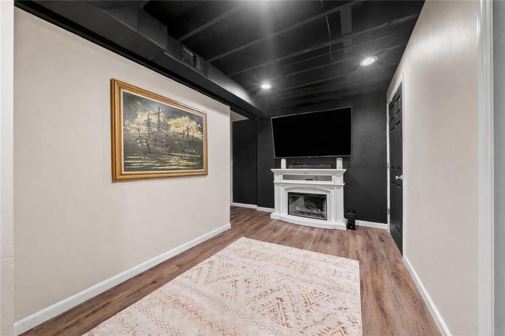 3032 Investors Road Washington, PA 15301 - Photo 35 of 50 Newly finished 16x12 basement area offering additional living space, ideal for a home office, gaming, or flex use, along with a second laundry room.