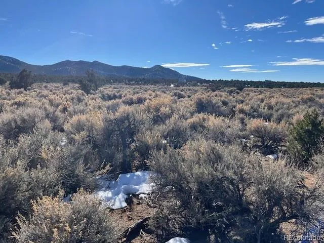 a view of mountain with sunset view