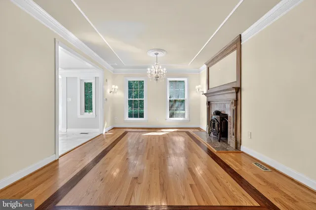 a kitchen with stainless steel appliances granite countertop a stove and a refrigerator