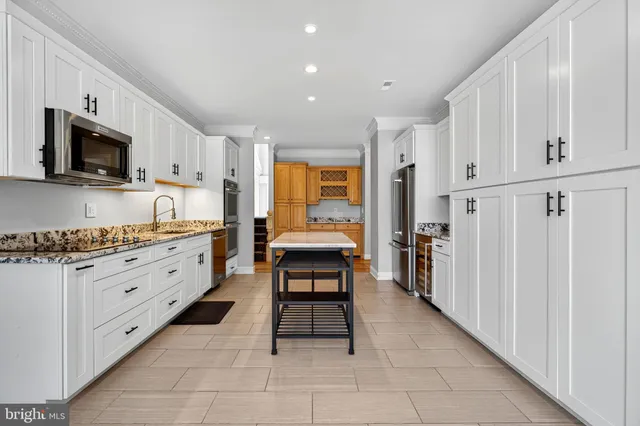 a view of livingroom with hardwood floor and a ceiling fan