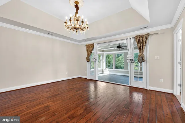 a pathway of a house with a yard