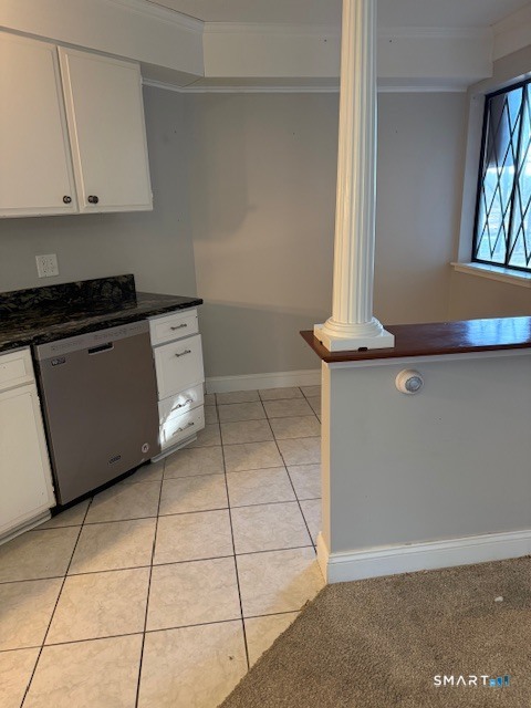85 River Road, Unit M4 Essex, CT 06426 - Photo 4 of 9 a kitchen with white cabinets and appliances